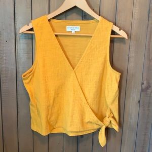 sleeveless yellow top